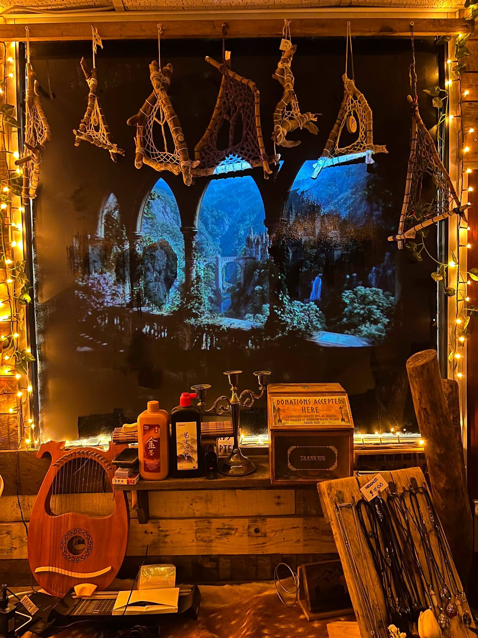 Atmospheric woodland projection inside The Elderwood Project workshop